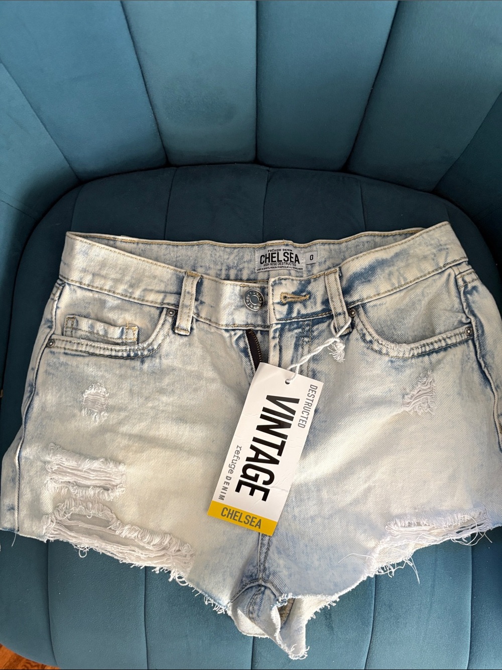 Chelsea Vintage Light Wash Distressed Denim Shorts